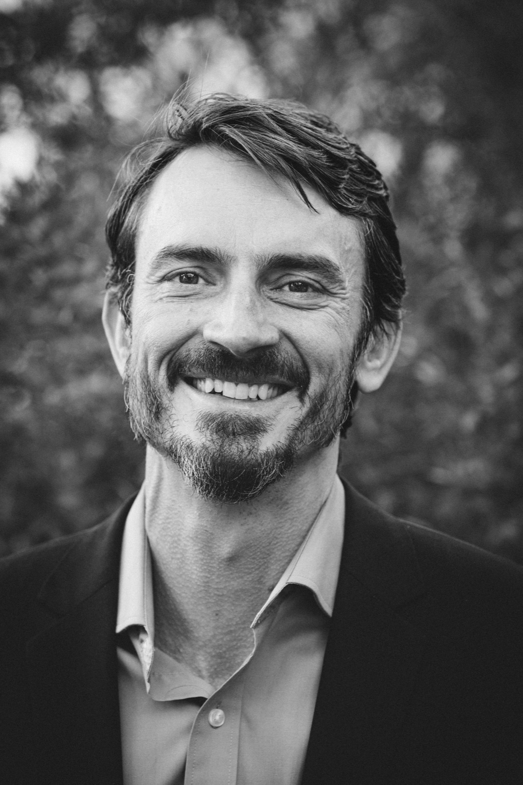 Black-and-white portrait of Luke Edwards